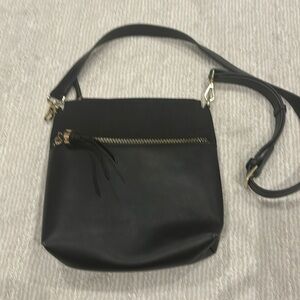Sandra Roberts Squared crossbody bag. Black with gold accents.
